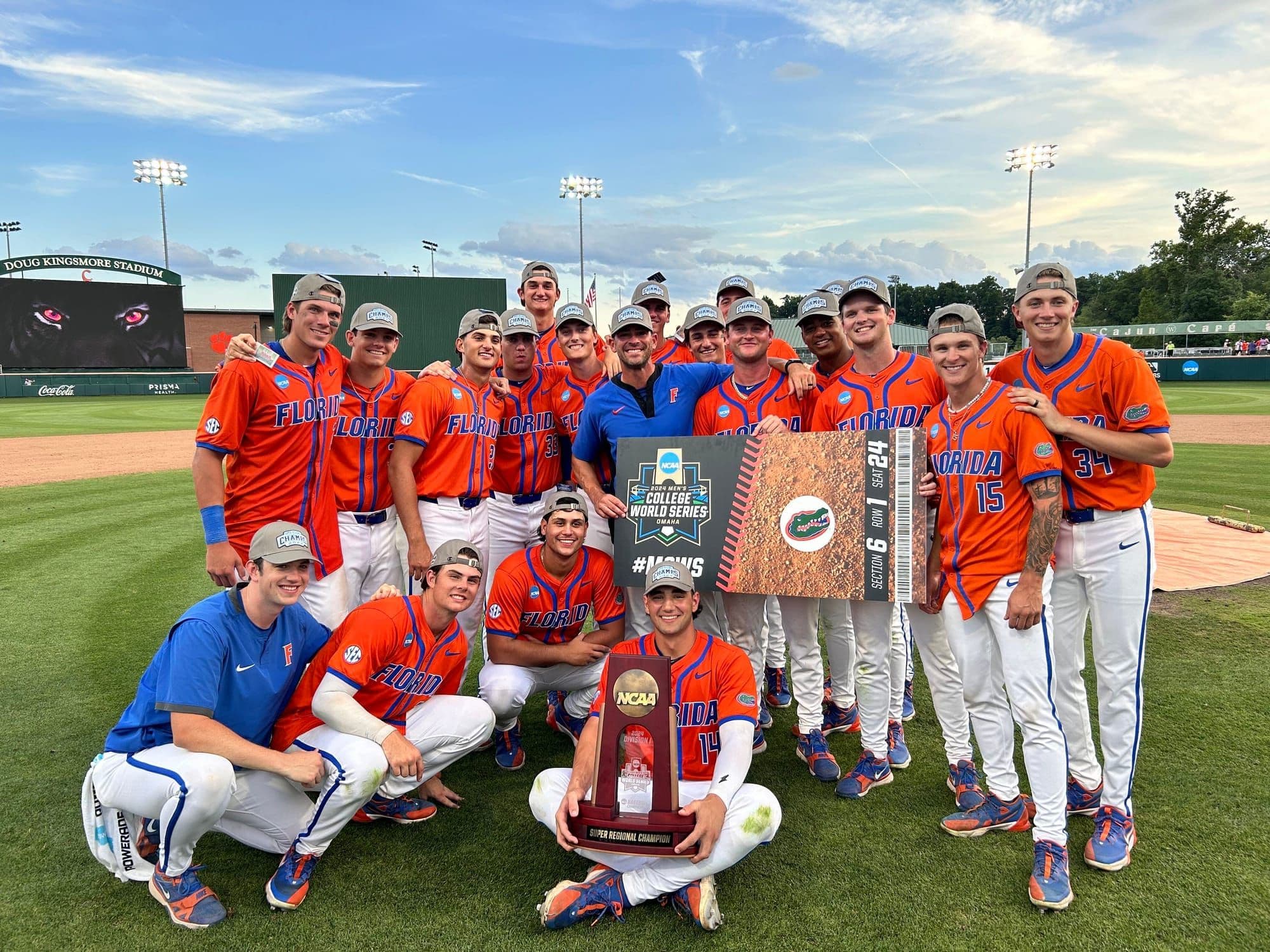 David Kopp with the Florida team and the 2024 Super Regional Champion trophy